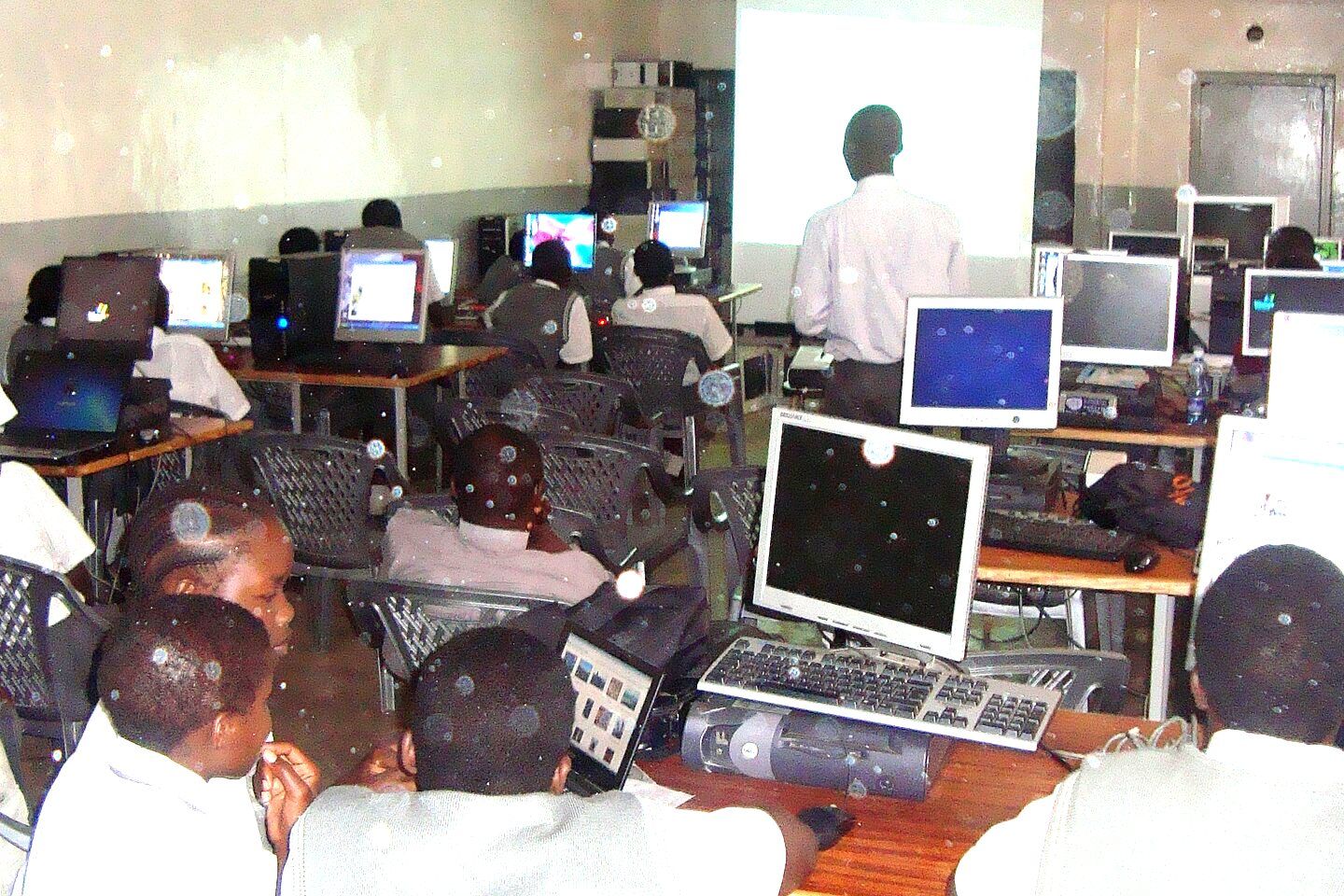 Pupils working at computers in the school ICT room